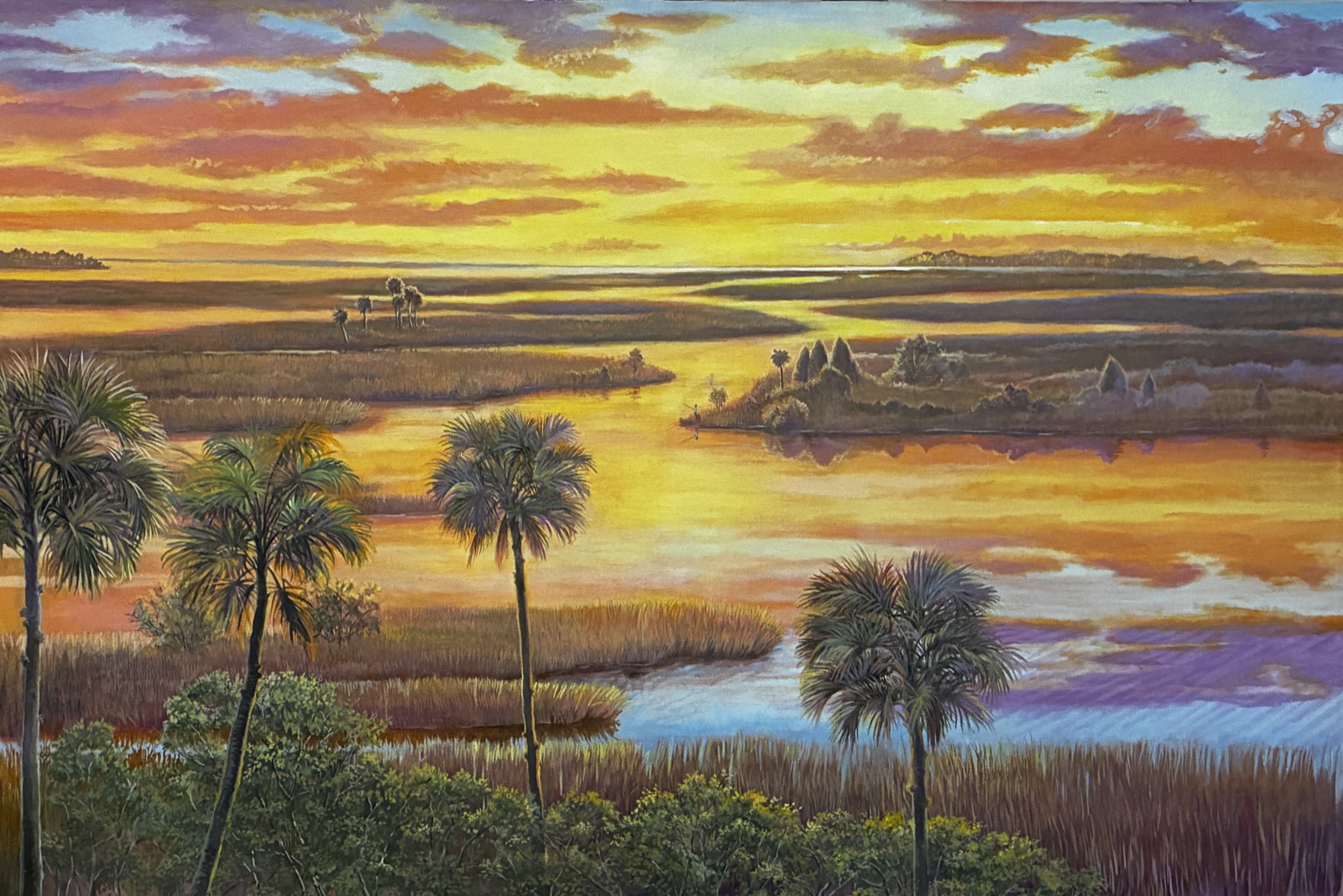 A salt marsh glowing at sunset